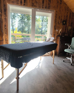 photo du cabinet avec table de massage